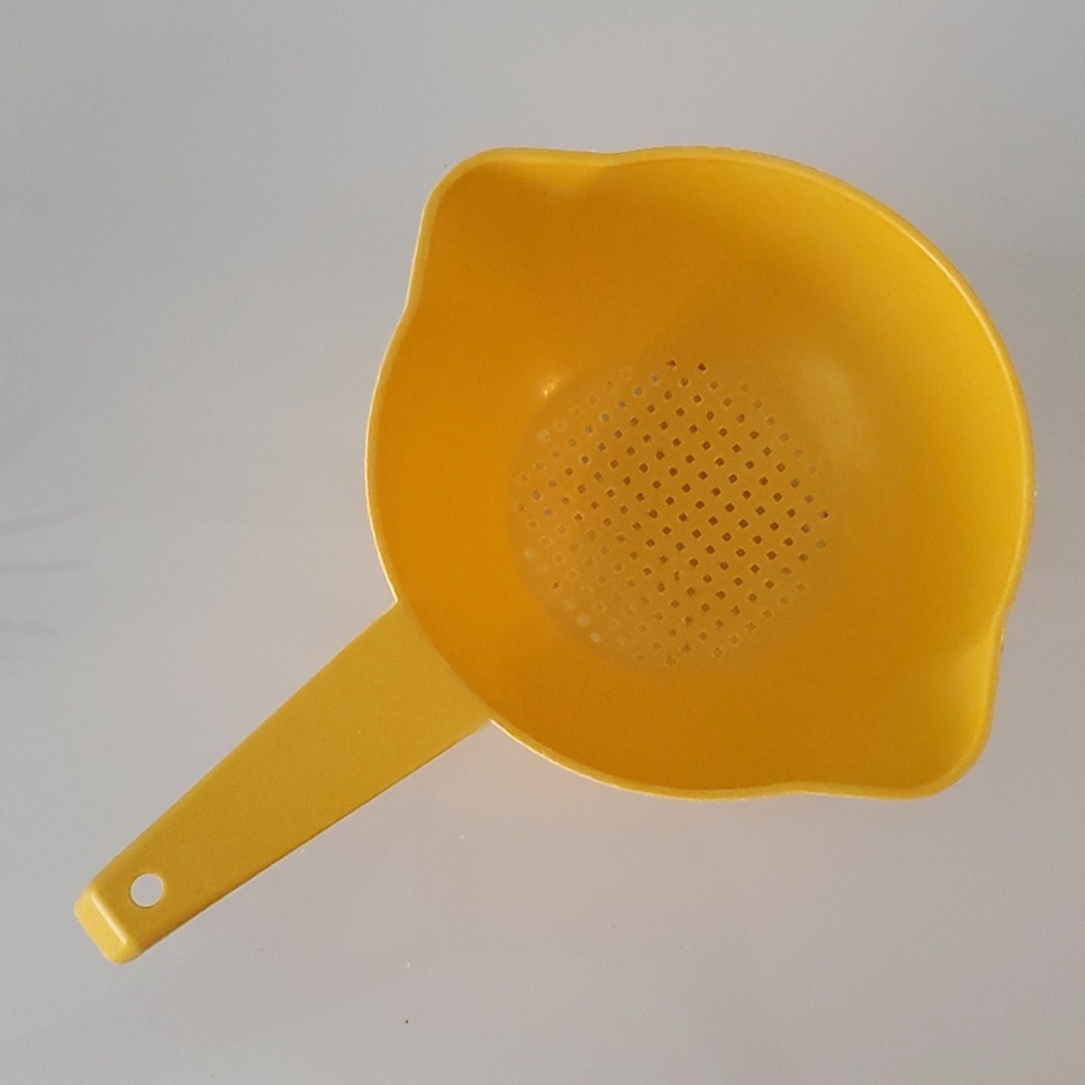 Yellow Tupperware Strainer Colander